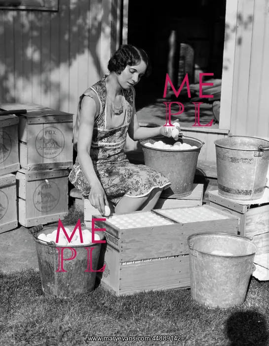 : Farmer's wife sorting eggs : Farmer's wife sorting eggs