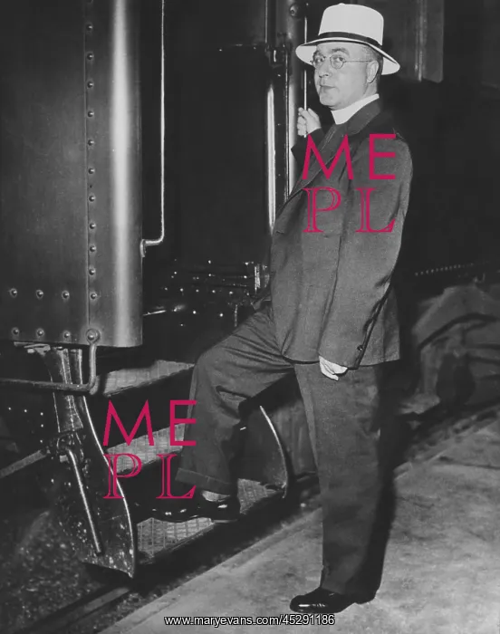 : Father Charles Coughlin boarding train to Chicago : Father Charles Coughlin boarding train to Chicago