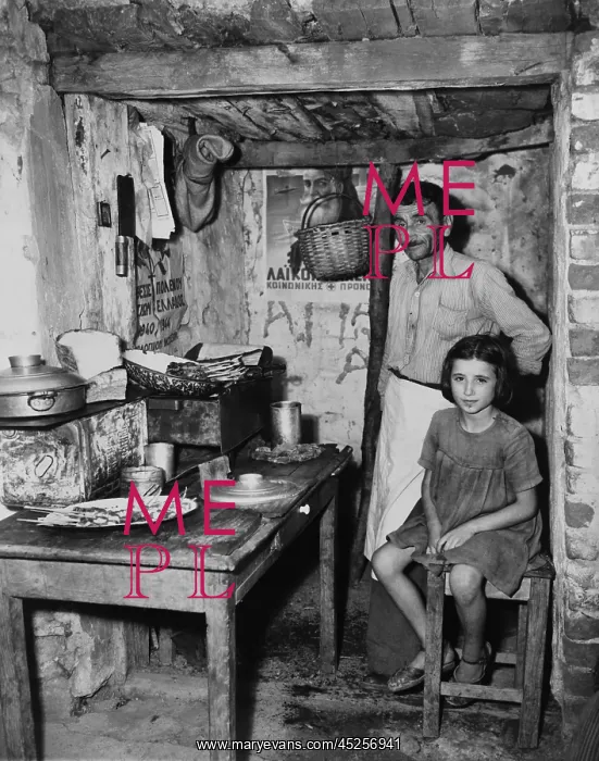: Father and daughter in sparse refugee quarters : Father and daughter in sparse refugee quarters