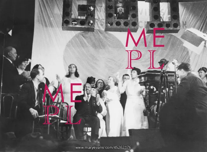 : Father Divine leading the singing at one of his : Father Divine leading the singing at one of his
