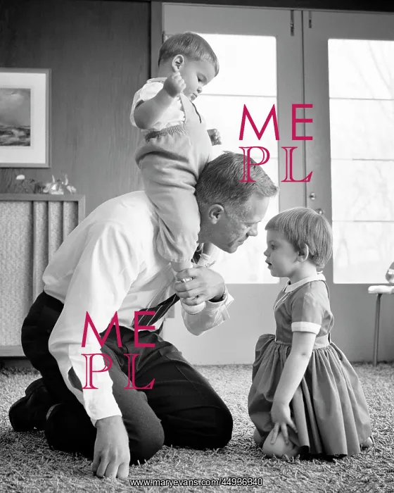 : Father Playing on Floor with Children Kneeling : Father Playing on Floor with Children Kneeling