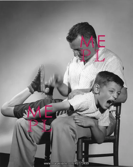 : Father with son over his lap while getting a spanking : Father with son over his lap while getting a spanking