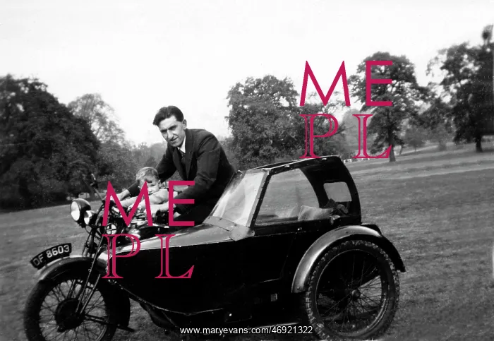 : Father & son on a veteran motorcycle : Father & son on a veteran motorcycle