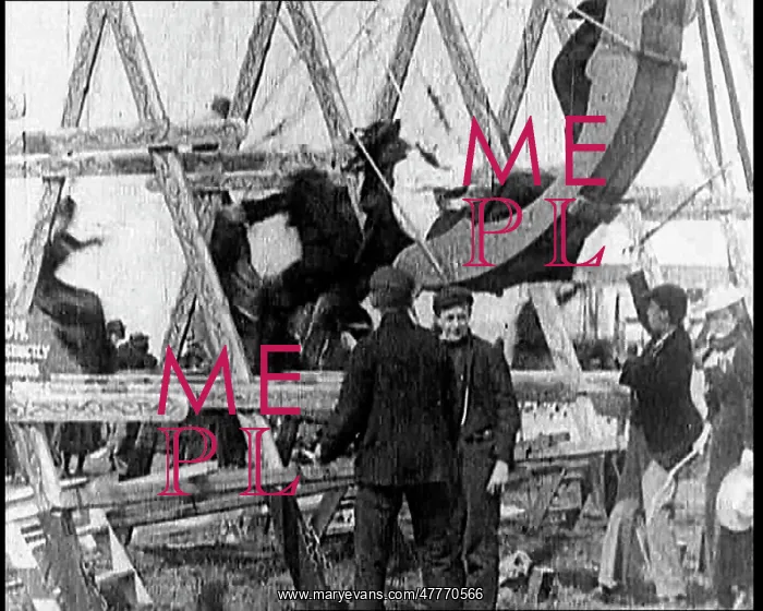 : Fathers Pushing Their Children On Large Swings : Fathers Pushing Their Children On Large Swings