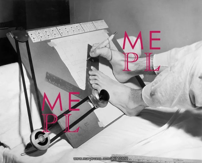 : Feet of a disabled man using a drafting board : Feet of a disabled man using a drafting board
