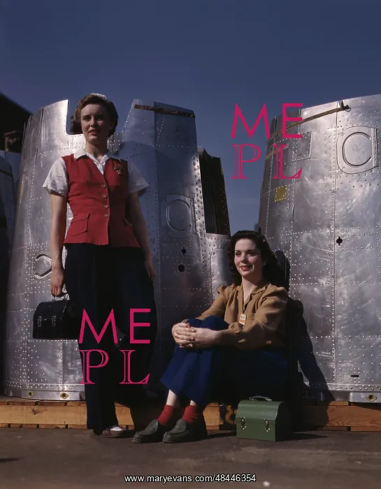: Two female assembly line workers enjoy a lunch : Two female assembly line workers enjoy a lunch