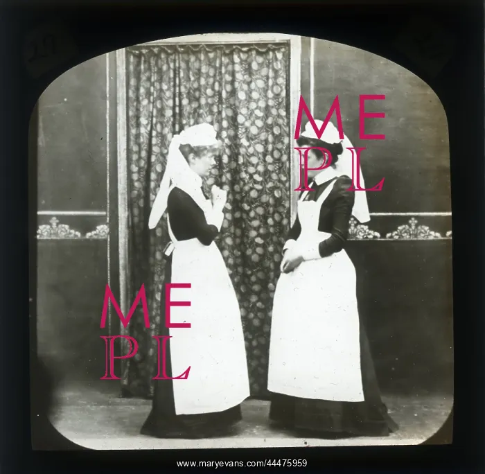  : Two female domestic servants in discussion