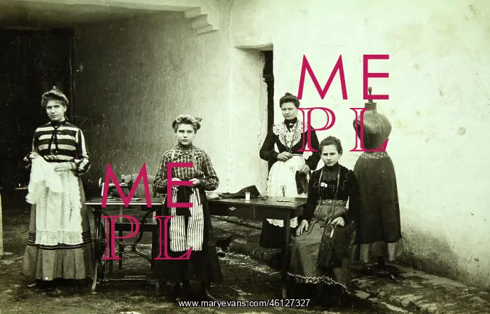 : Four female employees of a tailor shop in : Four female employees of a tailor shop in