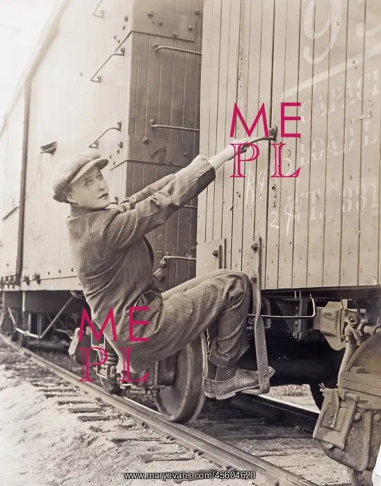  : Female hobo climbing freight train