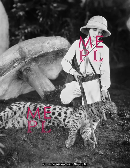  : Female hunter with dead leopard