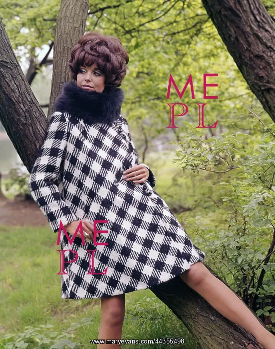 : Female model in Mary Quant style coat : Female model in Mary Quant style coat
