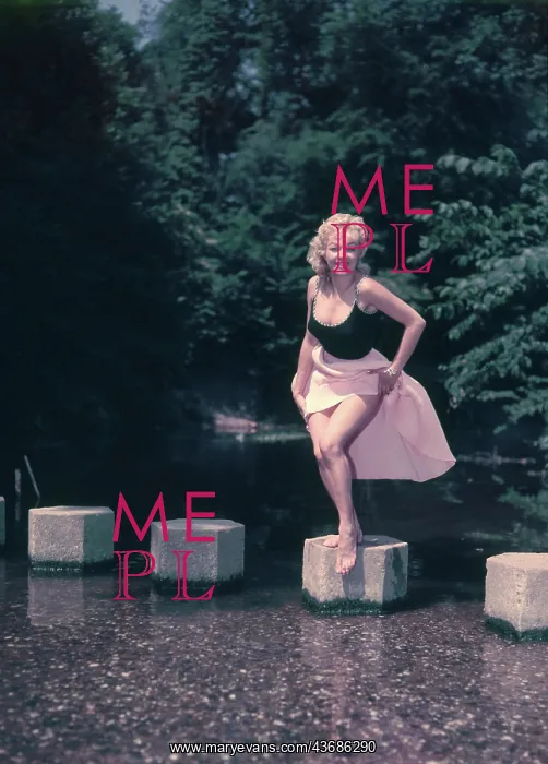 : Female model posing on stepping stones : Female model posing on stepping stones