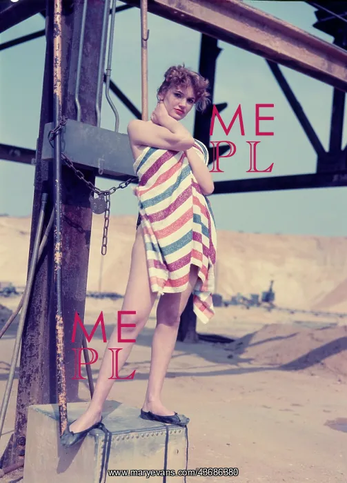 : Female model posing with stripy towel : Female model posing with stripy towel