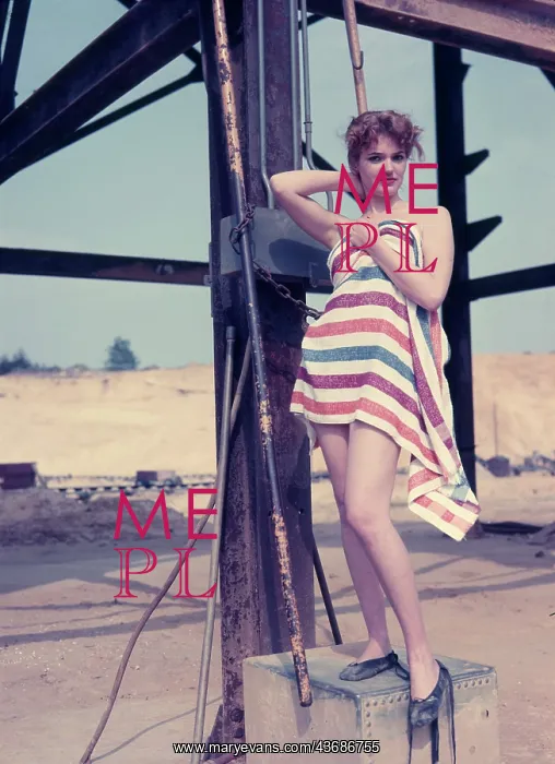 : Female model posing with stripy towel : Female model posing with stripy towel