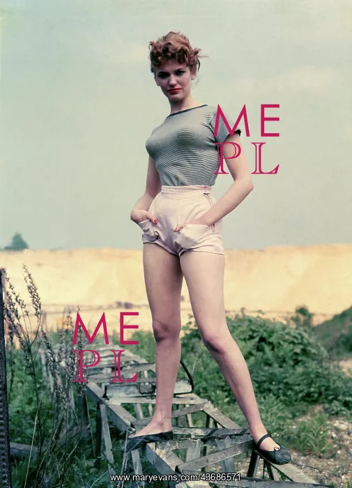 : Female model in top and shorts : Female model in top and shorts