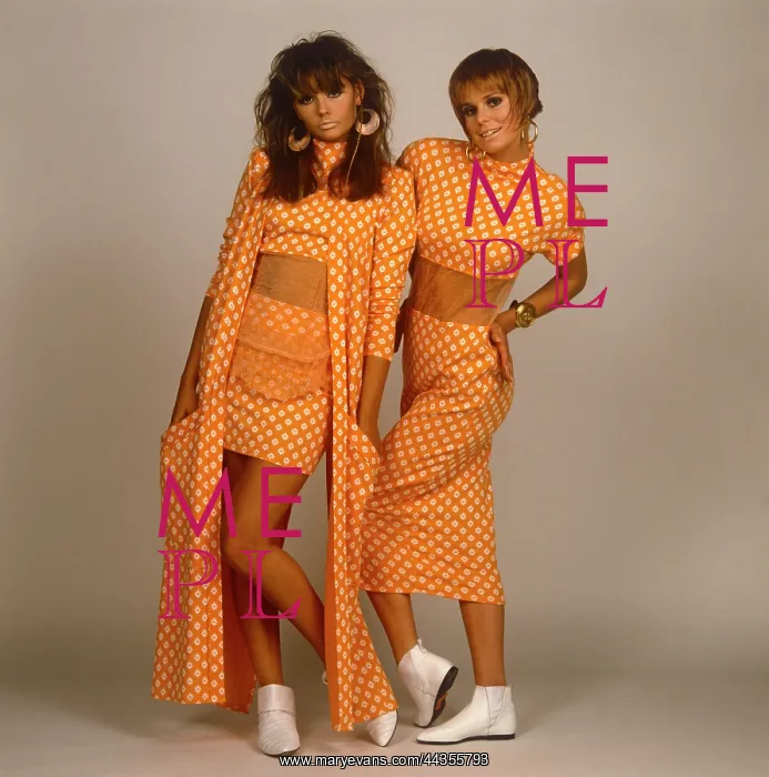 : Two female models in matching outfits : Two female models in matching outfits
