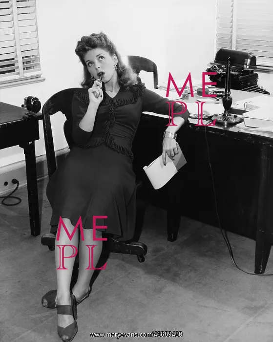 : Female office worker in thought : Female office worker in thought