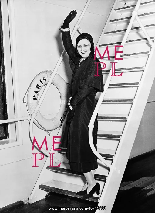  : Female passenger on boat waving