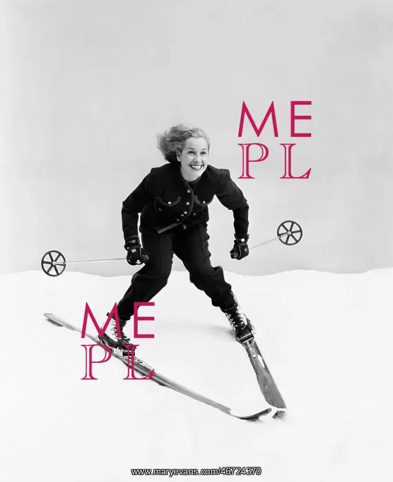 : Female skier skiing downhill : Female skier skiing downhill