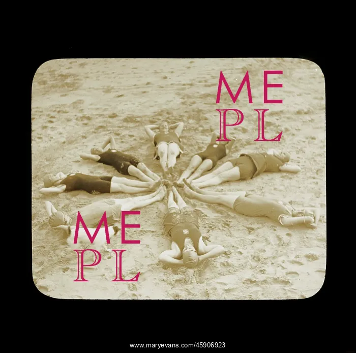 : Female swimmers lying in a circle on the beach : Female swimmers lying in a circle on the beach