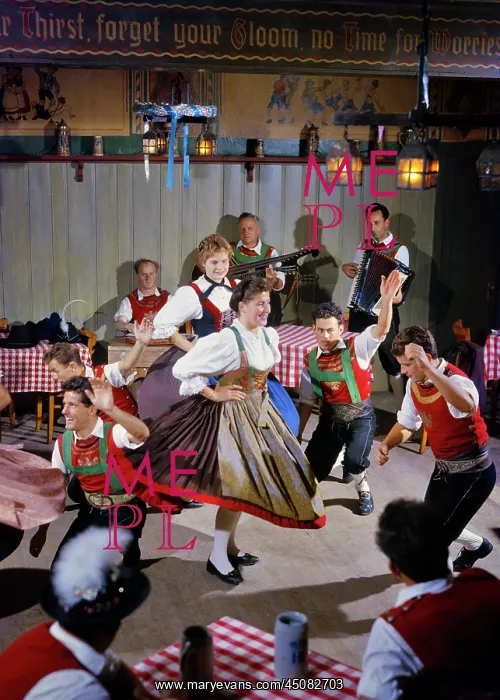 : Festive Tyrolean Dressed Costumed Dancers in a : Festive Tyrolean Dressed Costumed Dancers in a