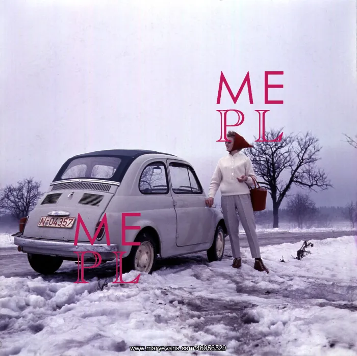 : Fiat 500. A woman stands next to her Fiat 500, amid a wintry scene of snow and cloud : Fiat 500. A woman stands next to her Fiat 500, amid a wintry scene of snow and cloud