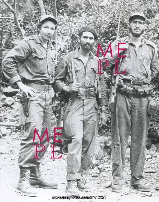 : FIDEL CASTRO (far right), with his brother ? : FIDEL CASTRO (far right), with his brother ?