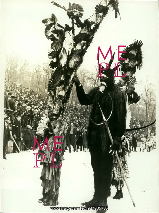 : Figure in strange costume in the snow : Figure in strange costume in the snow