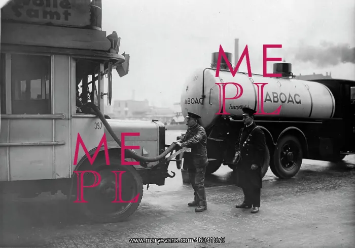  : Filling up buses in 1930