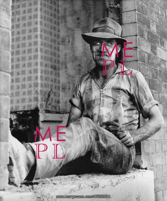: Filthy workman sits with a bottle of beer - Hulme : Filthy workman sits with a bottle of beer - Hulme