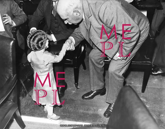 : Financier J.P. Morgan politely shakes hands with : Financier J.P. Morgan politely shakes hands with