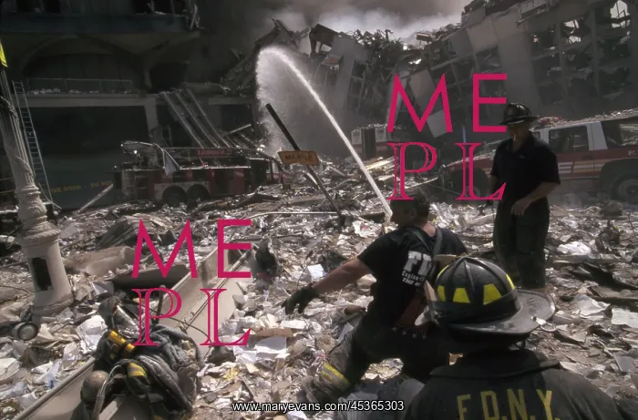 : Fire fighters set up a hose amid smoking rubble : Fire fighters set up a hose amid smoking rubble
