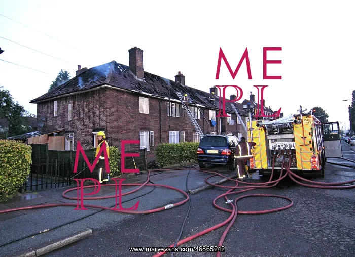 : Firefighers at the scene of a house fire, SE London : Firefighers at the scene of a house fire, SE London
