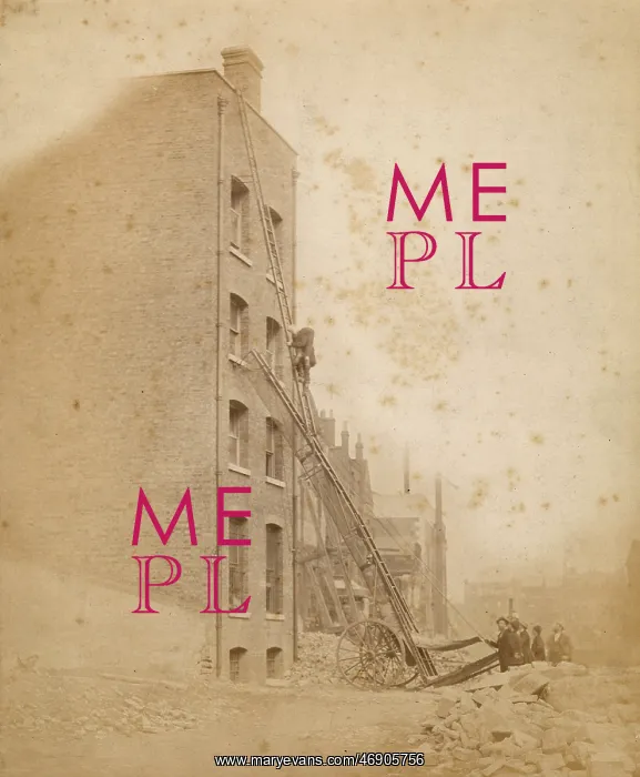  : A firefighter in action on a wheeled ladder escape
