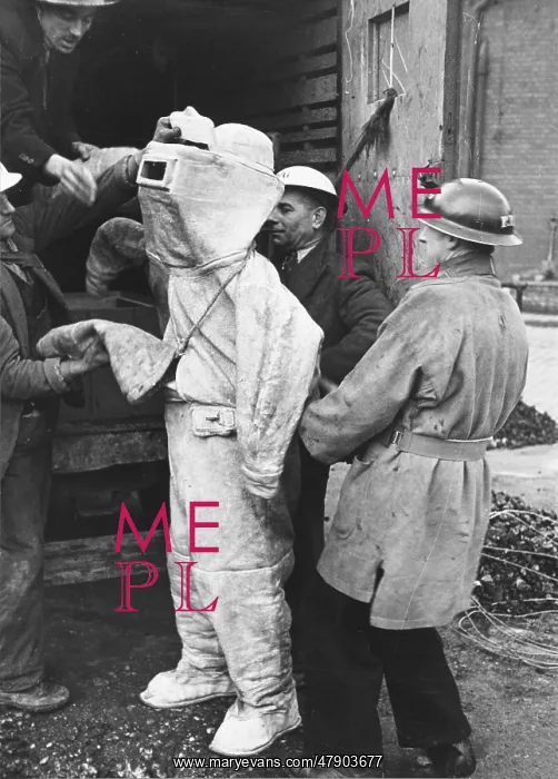 : Firefighter in asbestos suit WWII : Firefighter in asbestos suit WWII