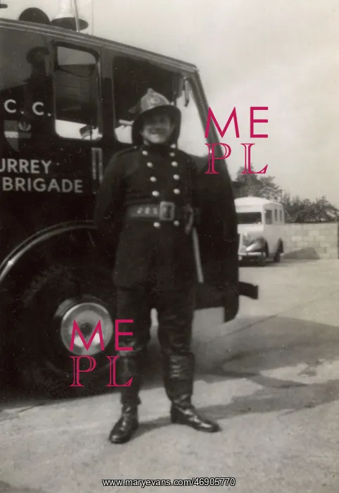 : Firefighter posing proudly by LCC LFB vehicle : Firefighter posing proudly by LCC LFB vehicle