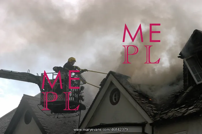 : Firefighter working from hydraulic platform : Firefighter working from hydraulic platform