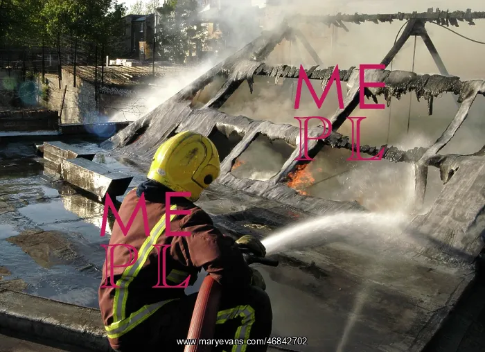 : Firefighter working at scene of fire, New Cross : Firefighter working at scene of fire, New Cross