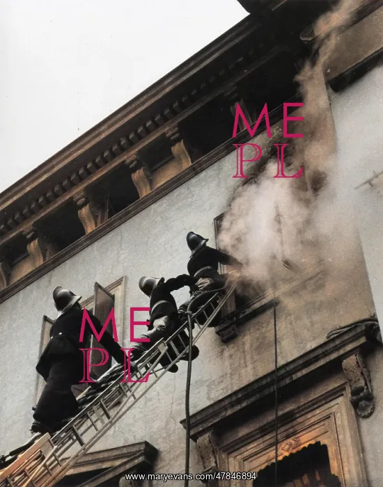  : Firefighters in action up a ladder