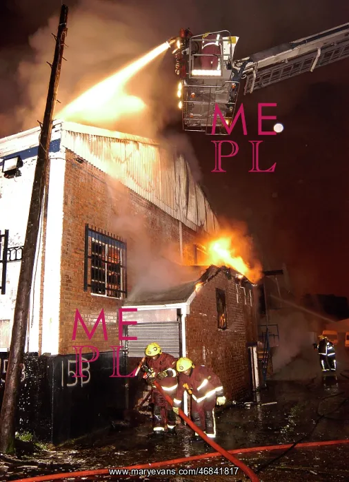 : Firefighters attending fire at commercial premises : Firefighters attending fire at commercial premises