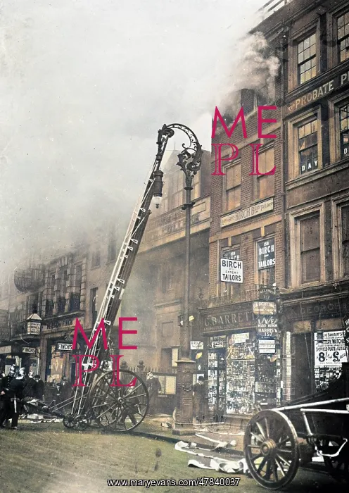 : Firefighters attending a fire in the Strand in London : Firefighters attending a fire in the Strand in London
