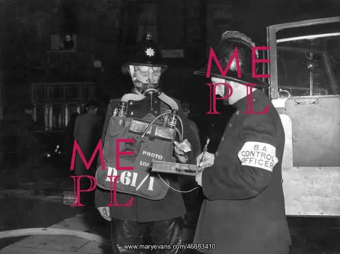 : Firefighters in breathing apparatus, Everett Street, SW8 : Firefighters in breathing apparatus, Everett Street, SW8