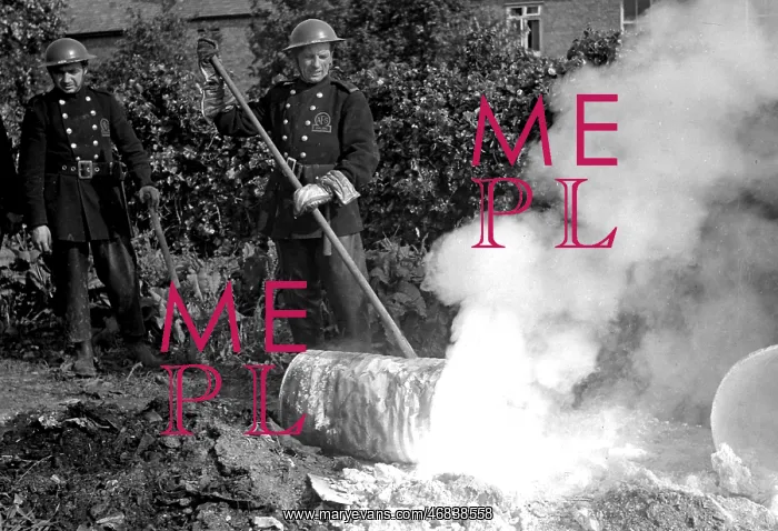 : Firefighters deal with small fire caused by explosion, WW2 : Firefighters deal with small fire caused by explosion, WW2
