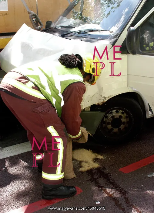 : Firefighters inspecting a broken down Ford transit van : Firefighters inspecting a broken down Ford transit van