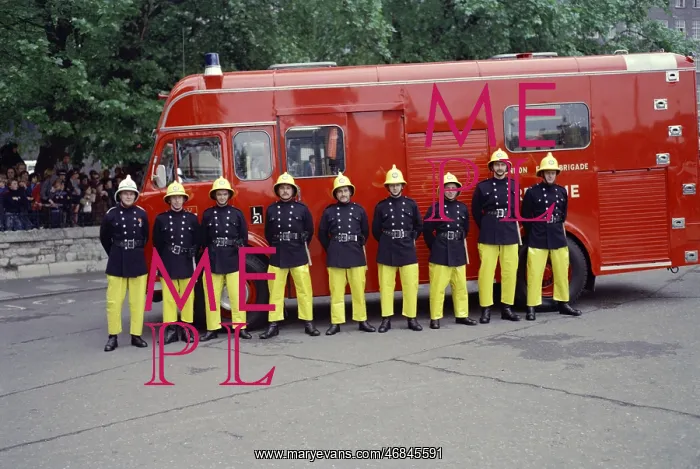 : Firefighters on parade in front of their appliance : Firefighters on parade in front of their appliance