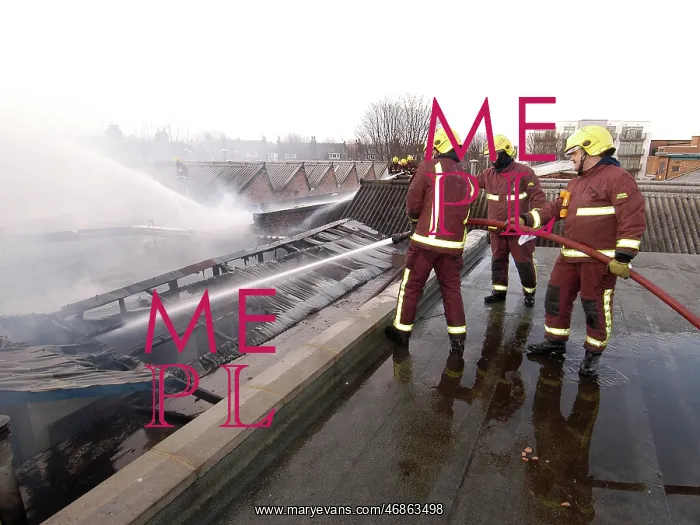: Firefighters at scene of commercial premises fire : Firefighters at scene of commercial premises fire