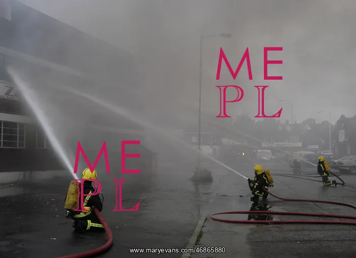 : Firefighters at scene of commercial premises fire : Firefighters at scene of commercial premises fire