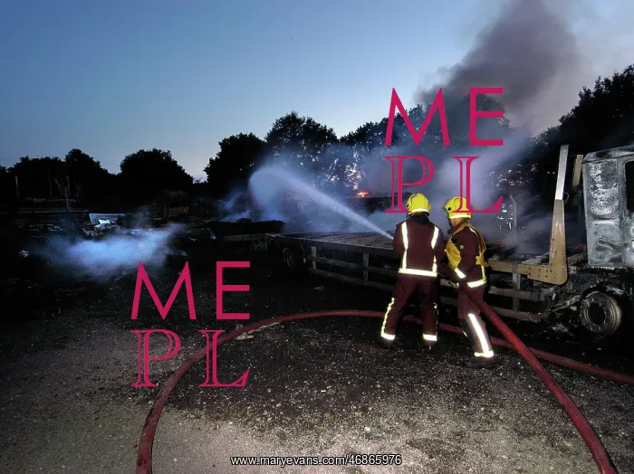 : Firefighters at the scene of a fire : Firefighters at the scene of a fire