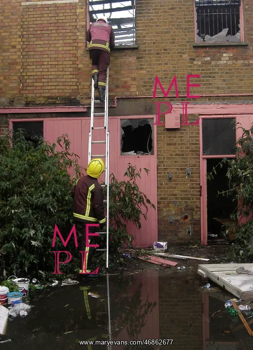 : Firefighters at the scene of a fire in Ruskin Road : Firefighters at the scene of a fire in Ruskin Road