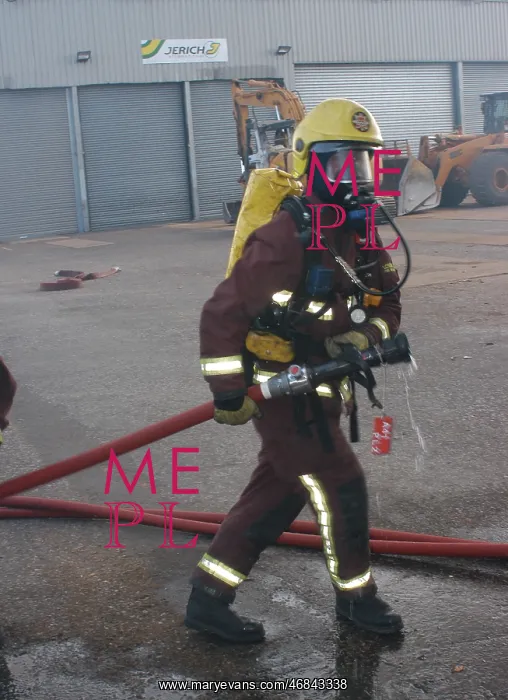 : Firefighters at scene of fire at Staples Corner : Firefighters at scene of fire at Staples Corner